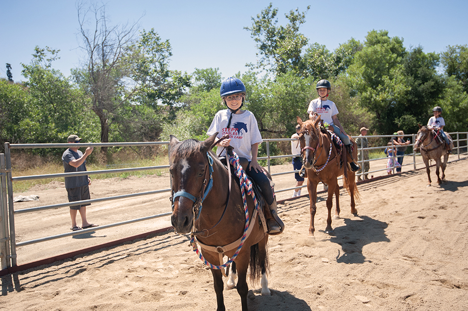 stepp-stables_summer-camp-child-smiling.jpg